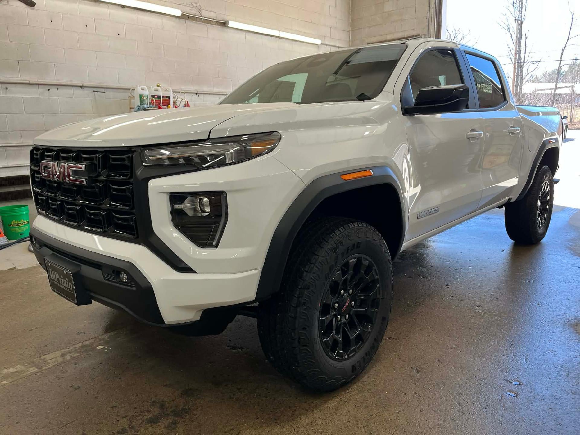 2026 GMC Canyon Elevation in Summit White — front three-quarter view