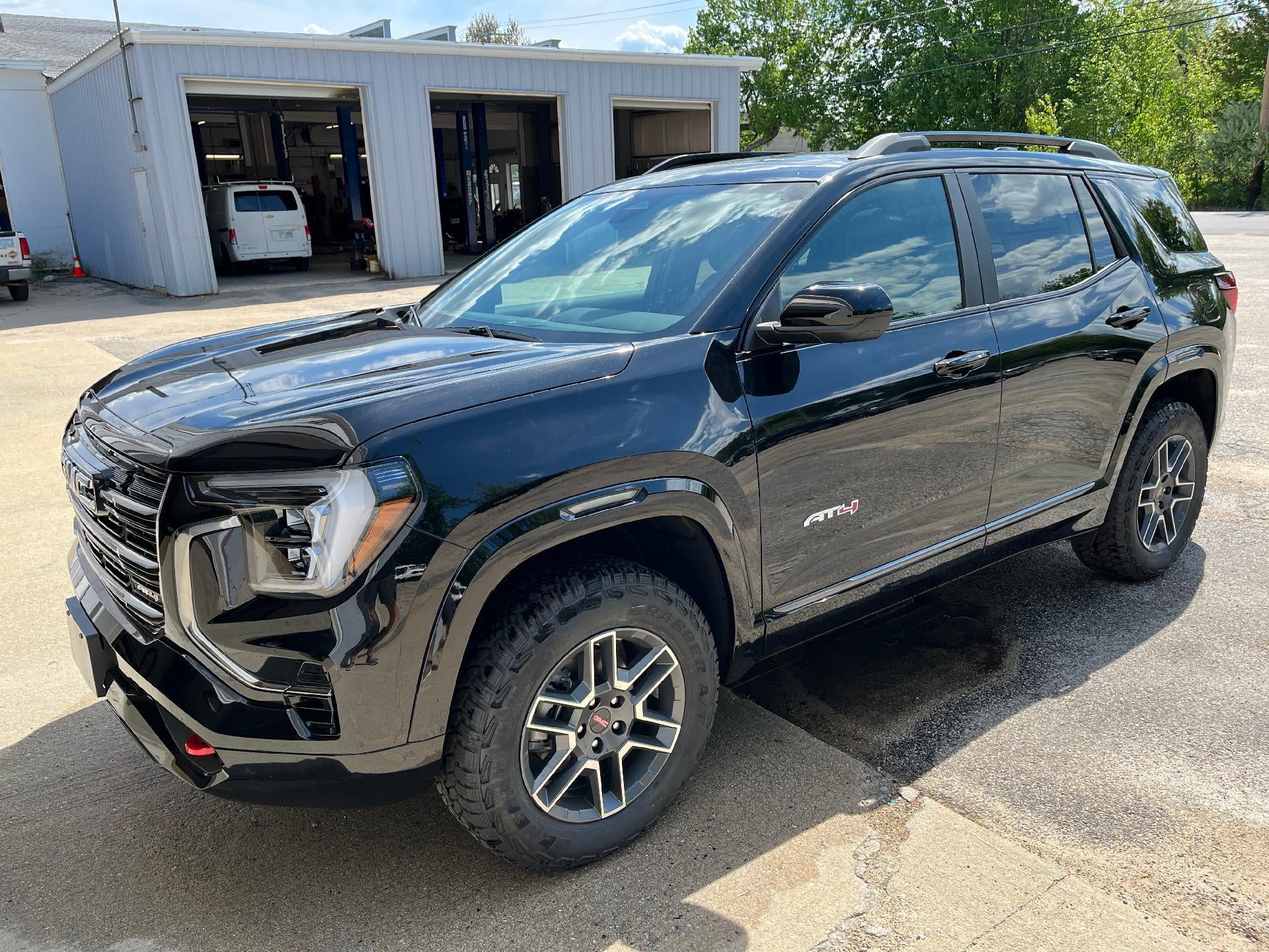 2026 GMC Terrain AT4 in Ebony Twilight Metallic — front three-quarter view